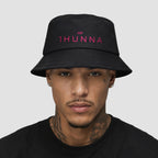 Black Casual Bucket Hat with pink 1HUNNA branding – front worn view