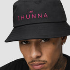 Black Casual Bucket Hat – pink 1HUNNA front logo detail