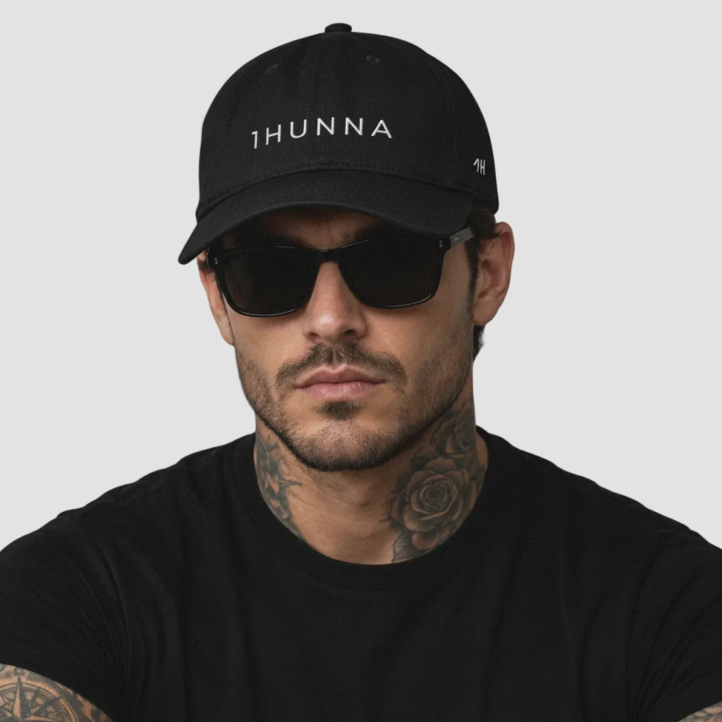 Black Casual Dad Hat with light 1HUNNA branding – front worn view