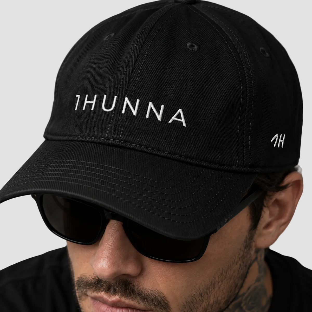 Black Casual Dad Hat – front wordmark and side detail