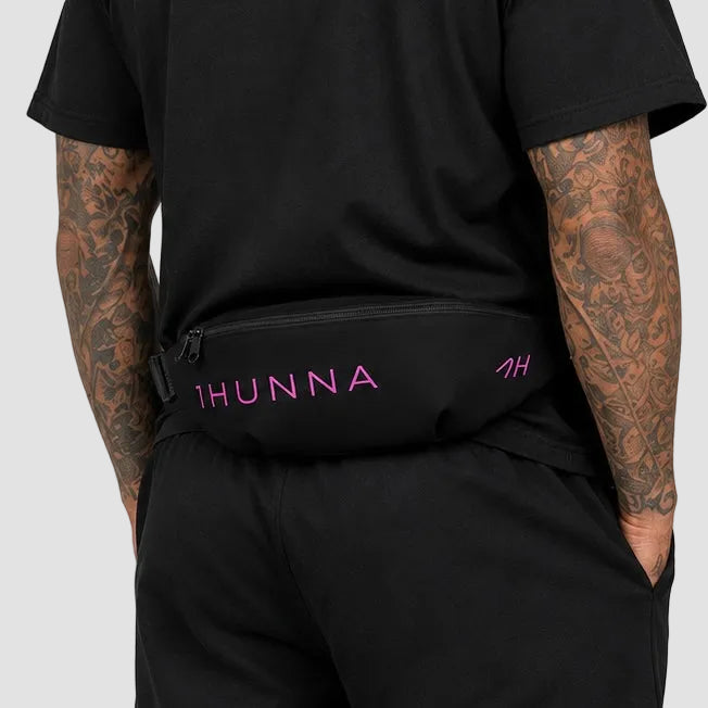 Black Casual Crossbody Bag with pink 1HUNNA branding – worn at the waist